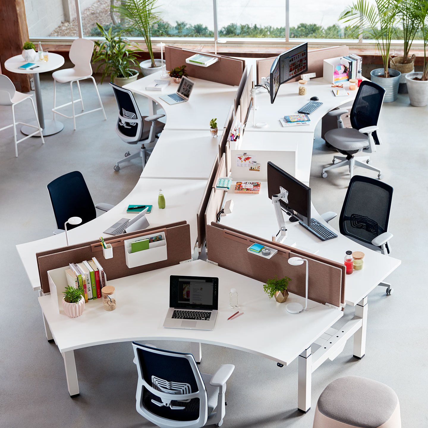 Haworth Belong Sceen in etch brown on multiple desks in open office area