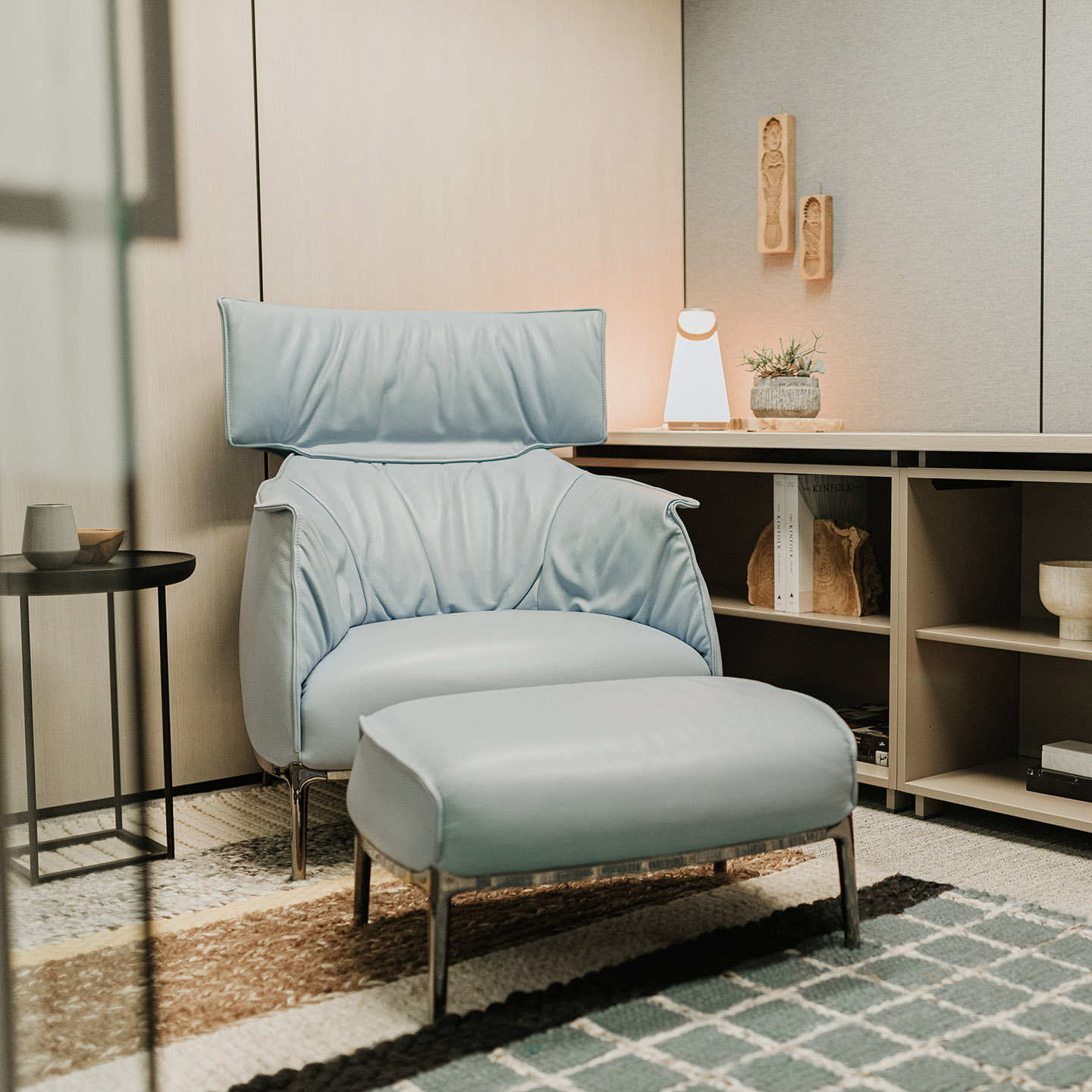Blue Haworth Archibald lounge chair with ottoman in refresh space