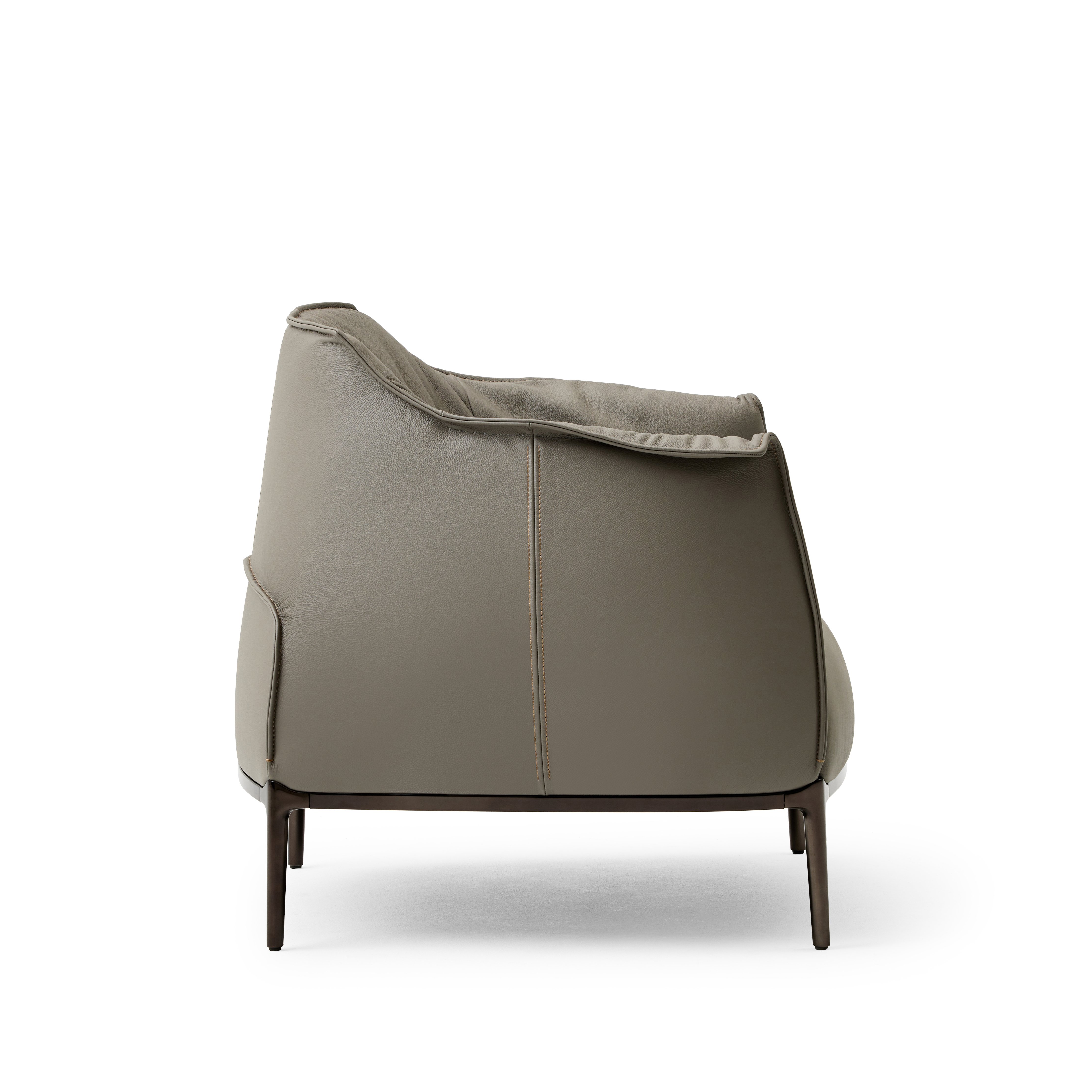 Detail side shot of the Archibald Lounge chair in Gray