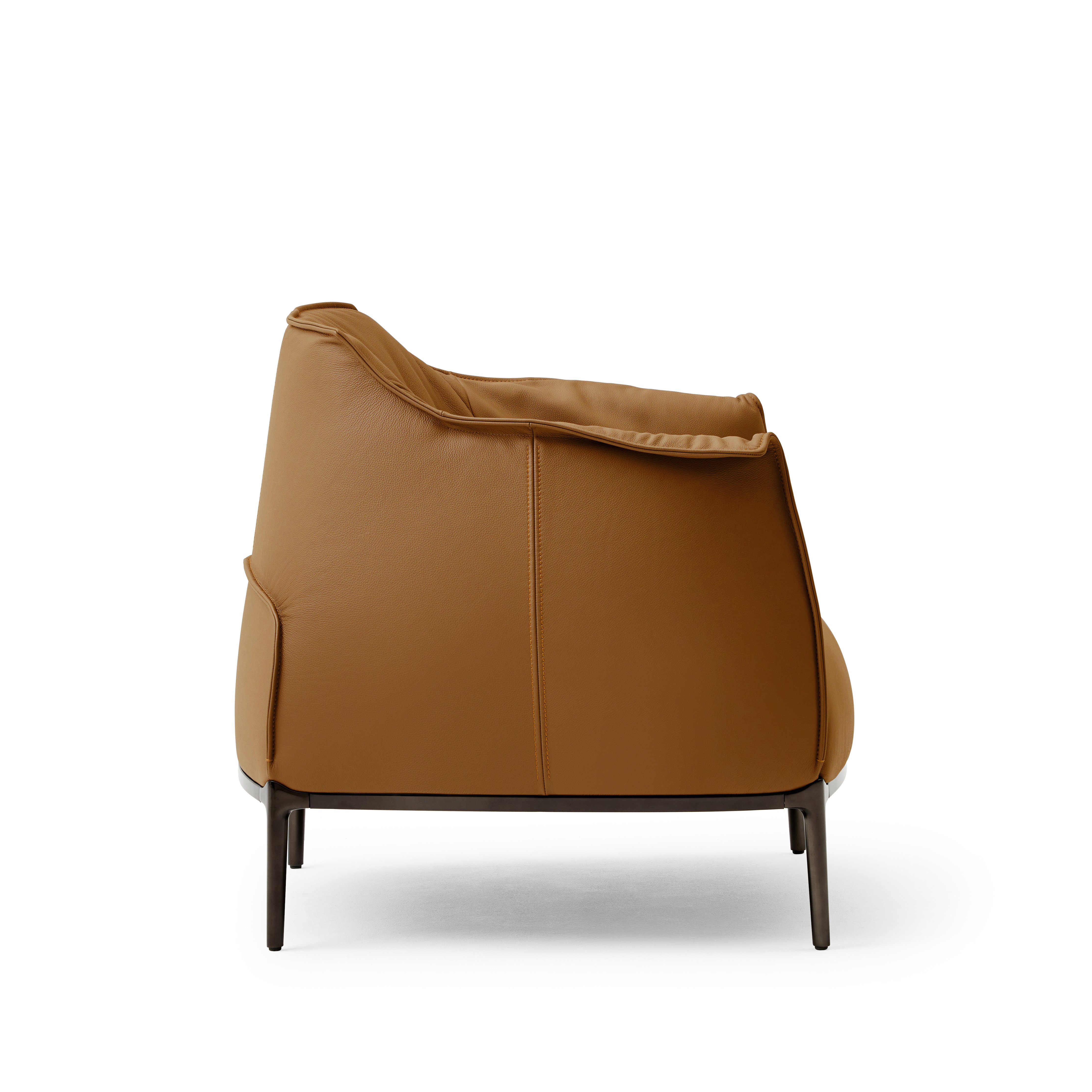 Detail side shot of the Archibald Lounge chair in Brown