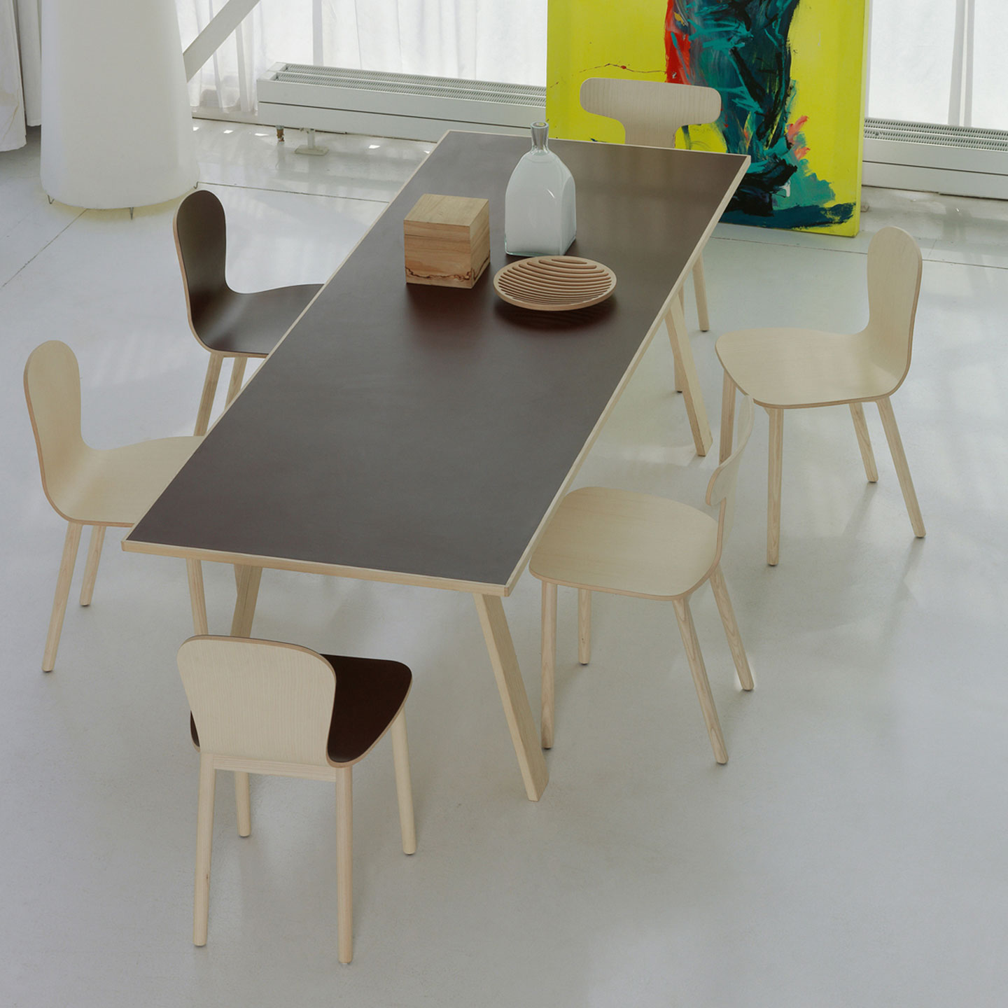 Haworth Bac Two side chairs in light brown wood in dining area