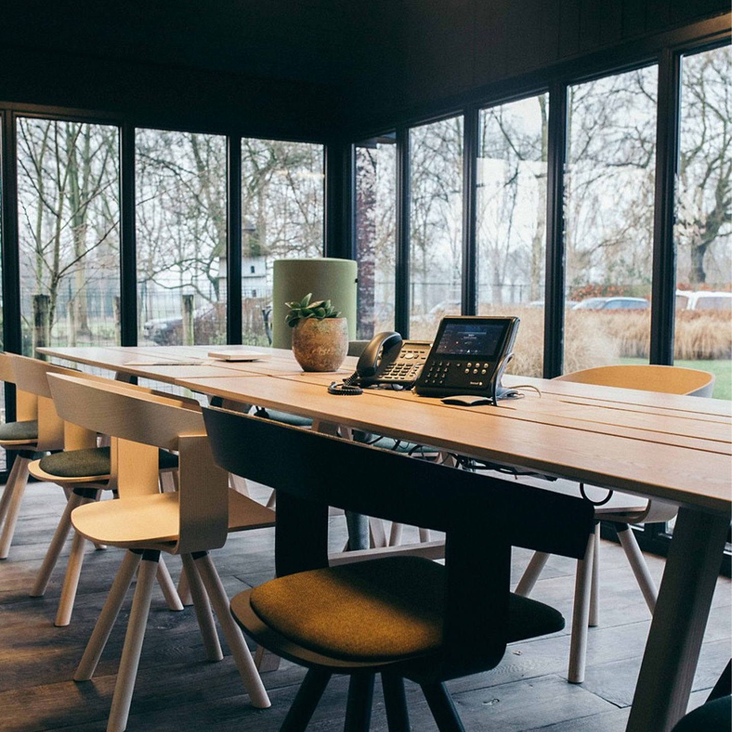 Haworth Buzzifloat chairs at an open conference room space