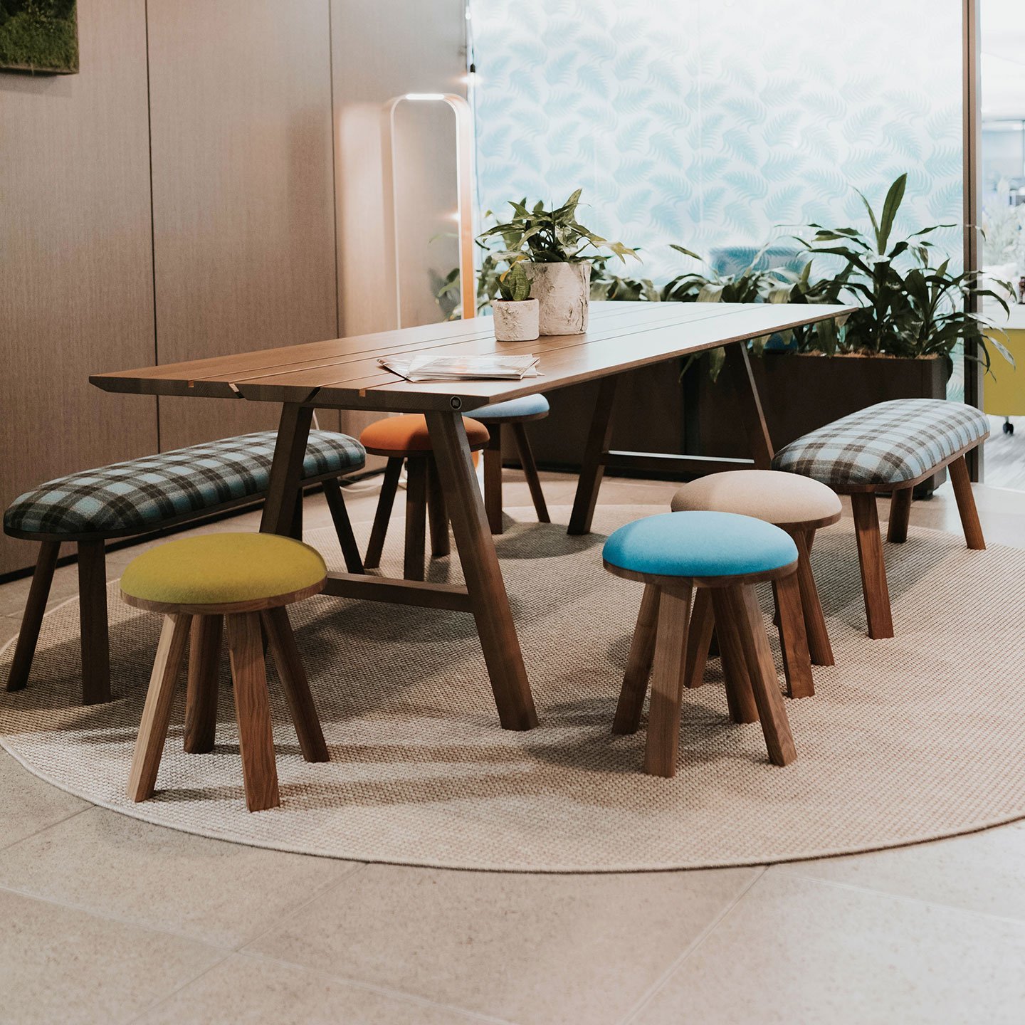 Haworth BuzziMilk stools in colorful seating options at a cafe