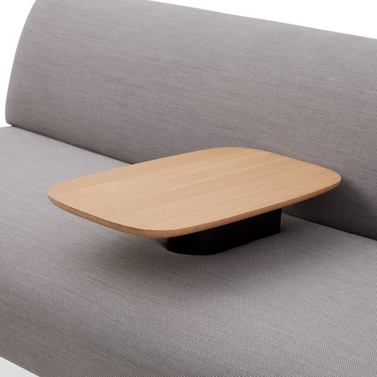 Haworth Cabana lounge island with integrated table in light brown wood and grey color couch