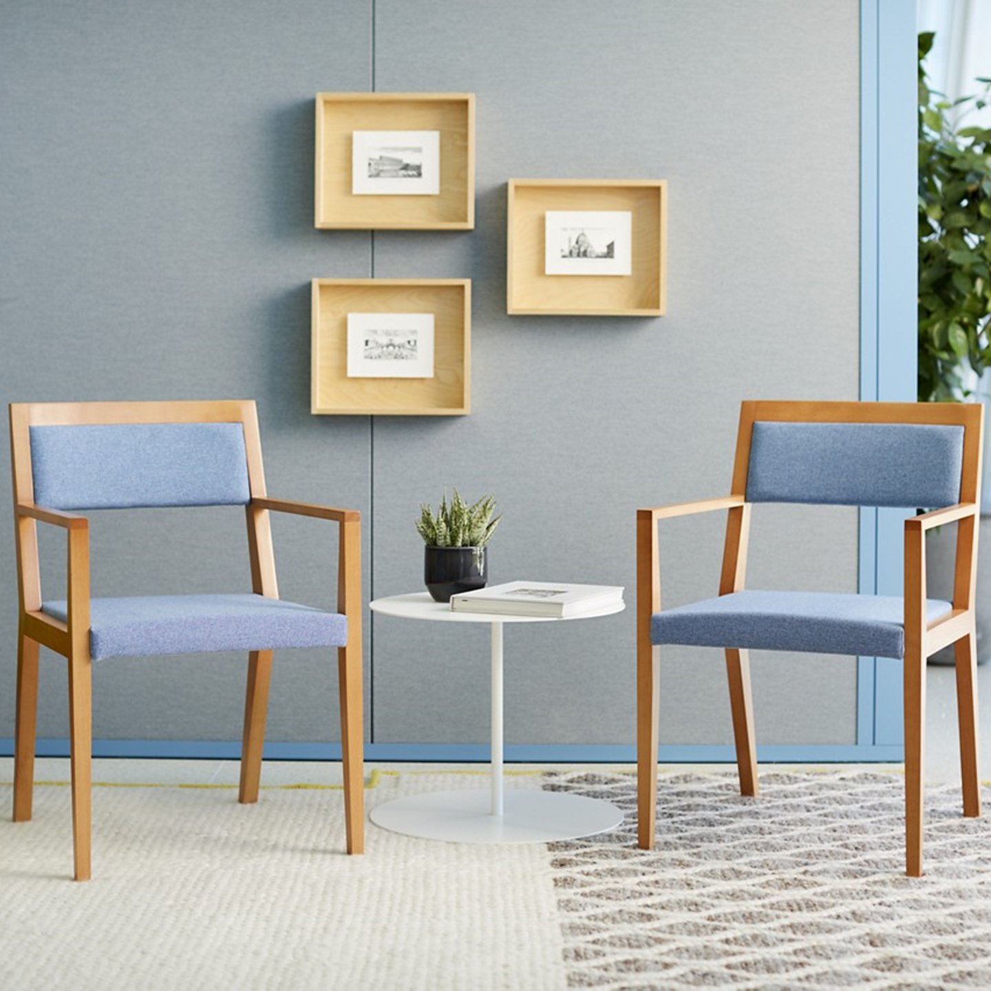Haworth Candor chairs in blue fabric with wooden structure in a living room