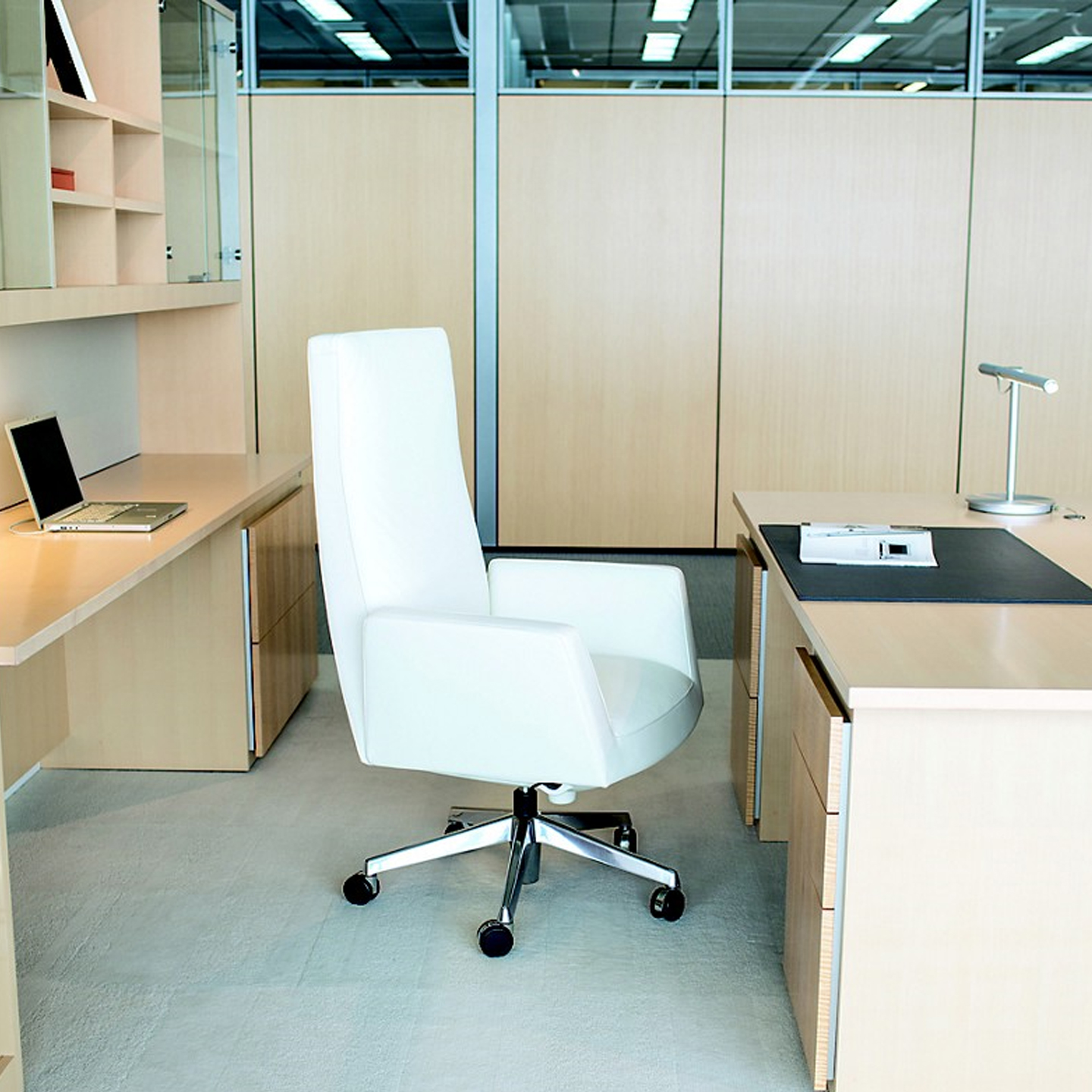 Haworth Chancellor chair in white in a office cabin by the table