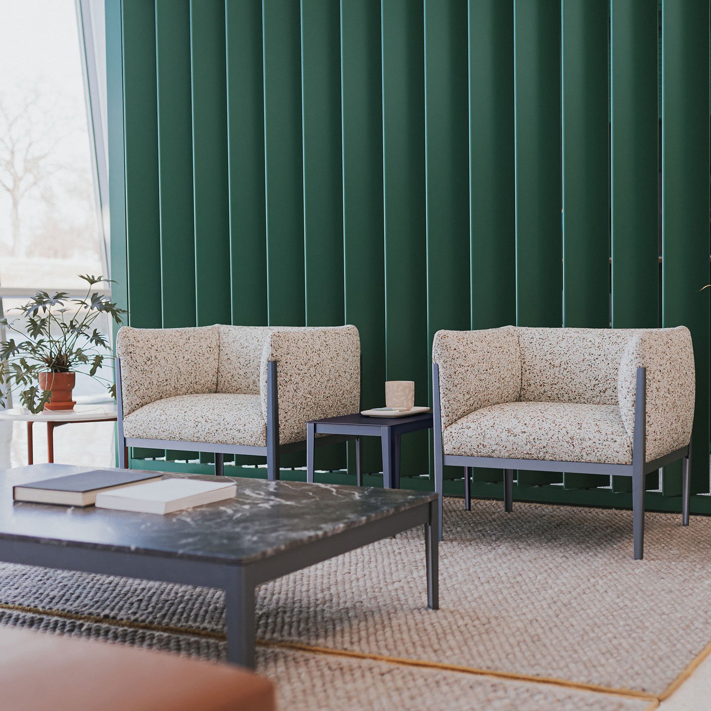 Haworth Cotone chairs in off white printed upholstery in a living room