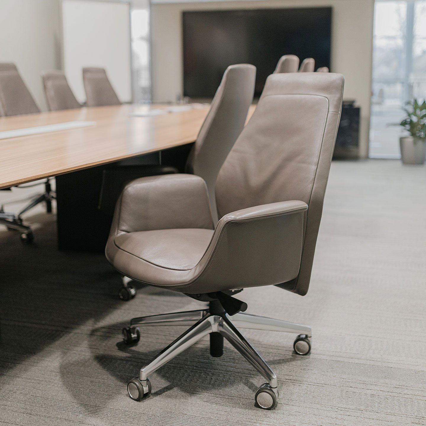 Haworth Downtown chairs in light brown leather in a conference room