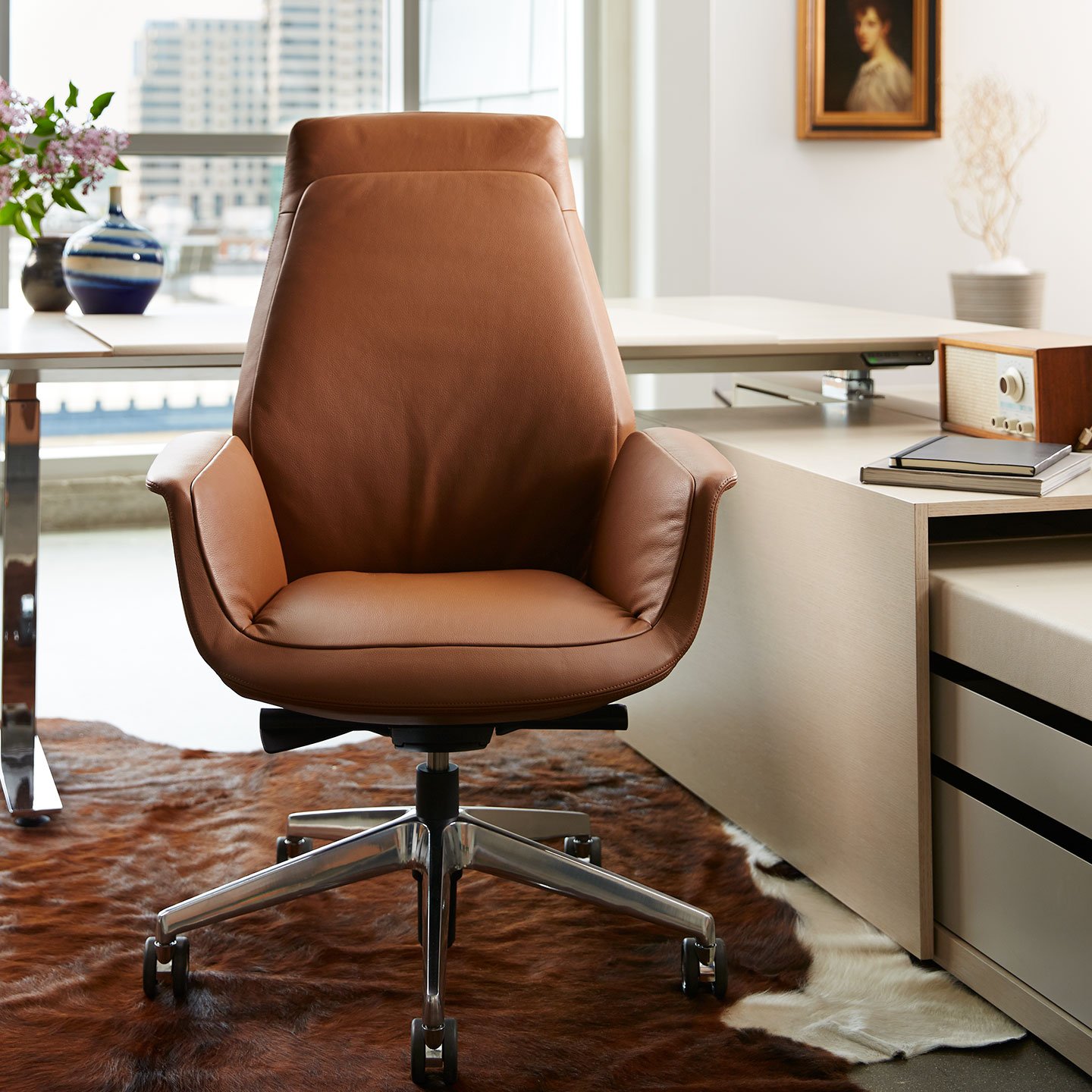 Haworth Downtown chair in tan leather in a office cabin