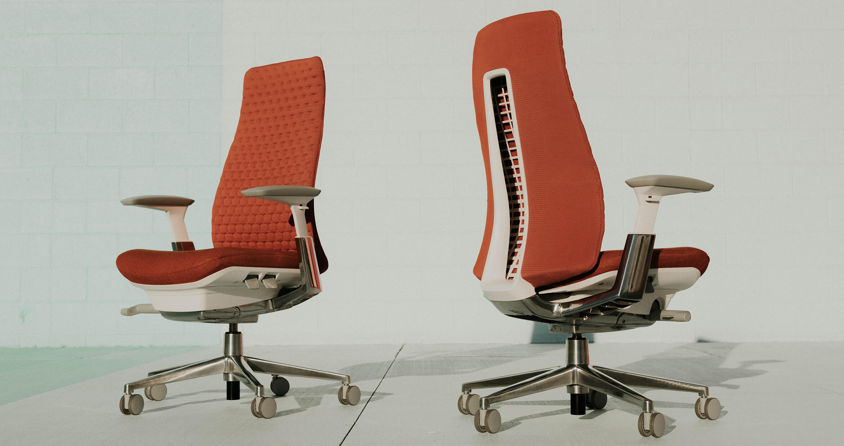 Haworth Fern Task chairs in red upholstery with Digital Knit back 