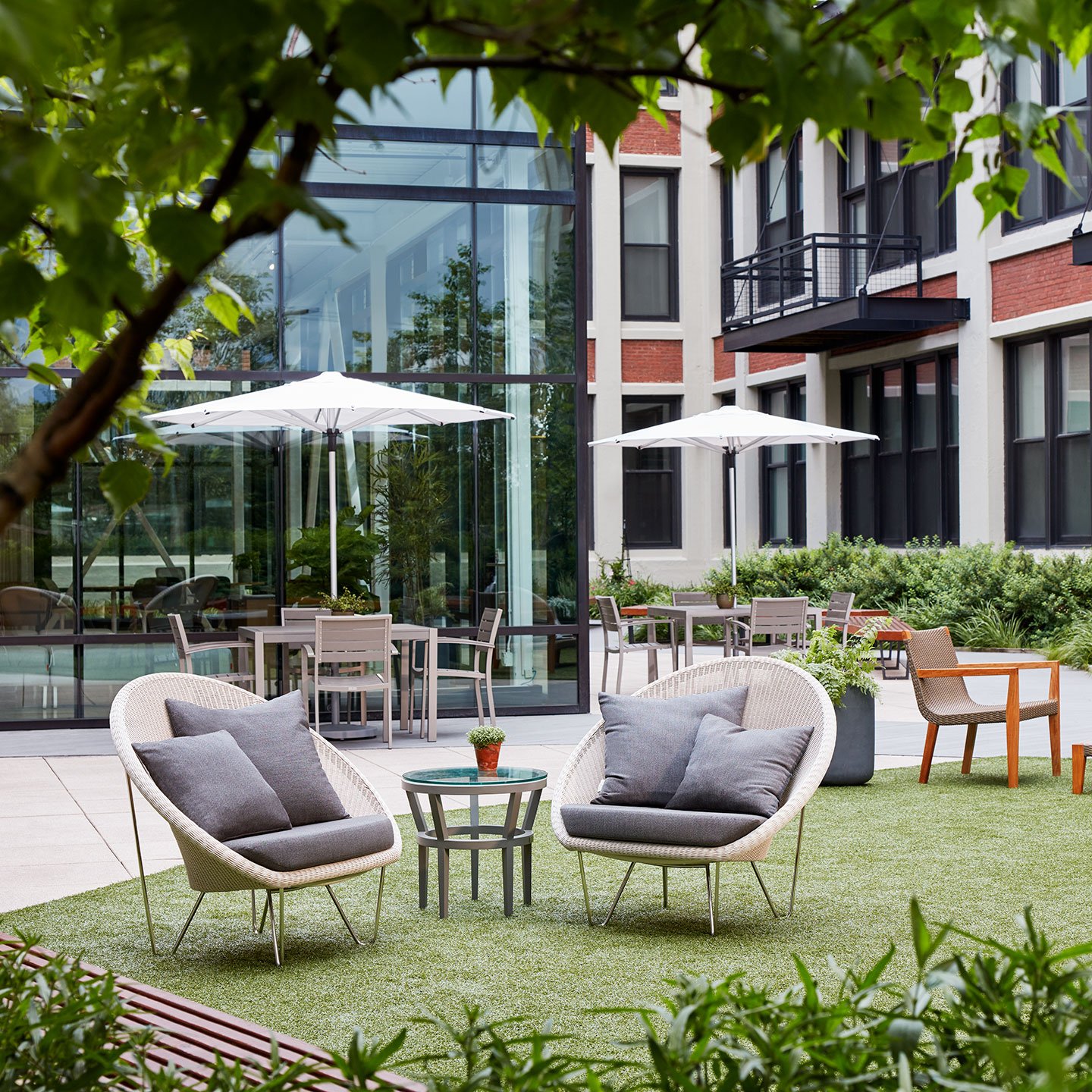 Haworth Gigi II lounge chairs in an outdoor cafe in a lawn