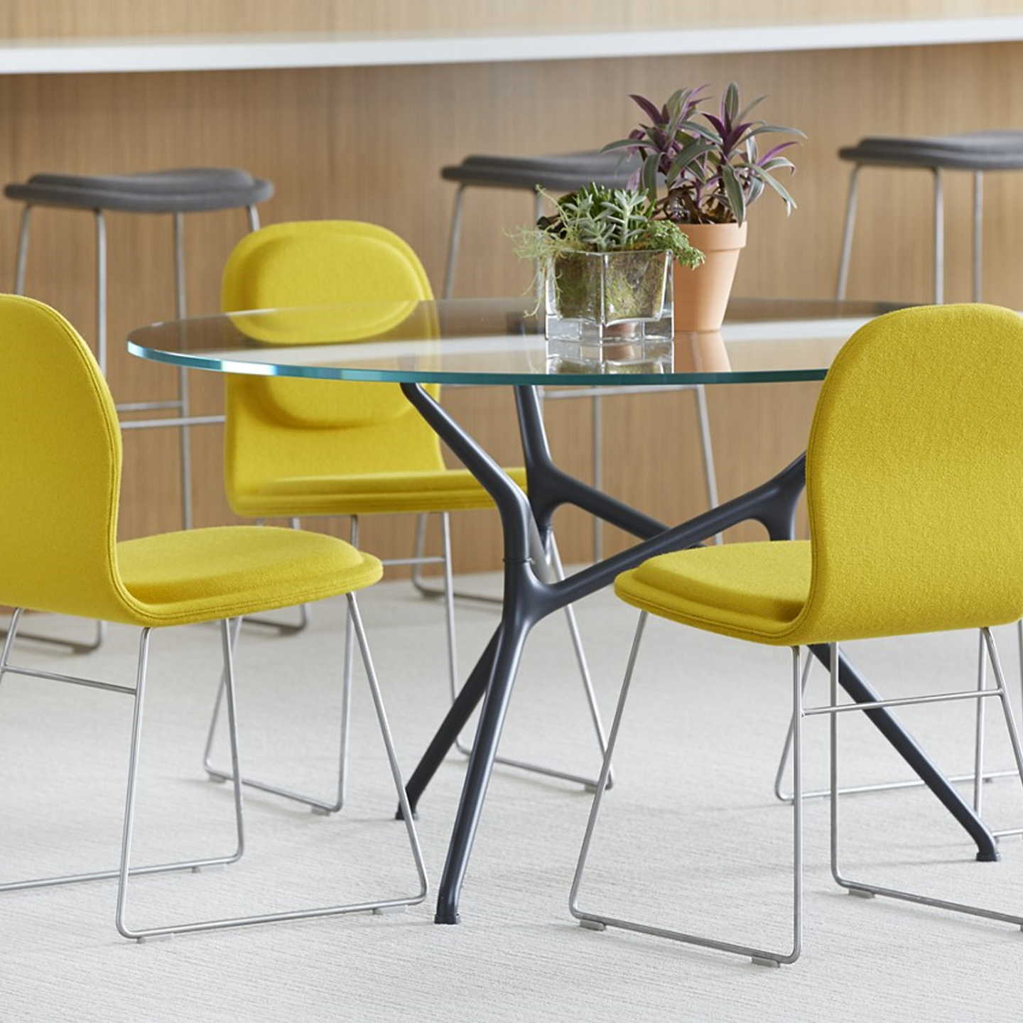 Haworth Hi Pad chair in mustard yellow upholstery at a cafe