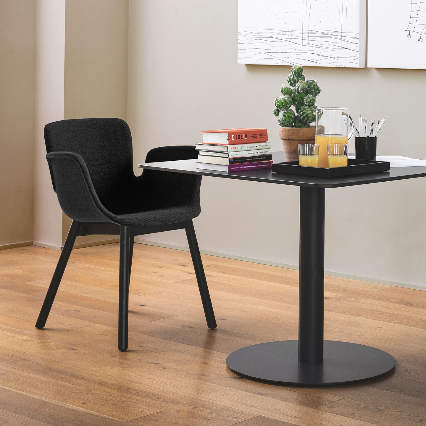 Haworth Juli Soft chair in black color in a casual office space
