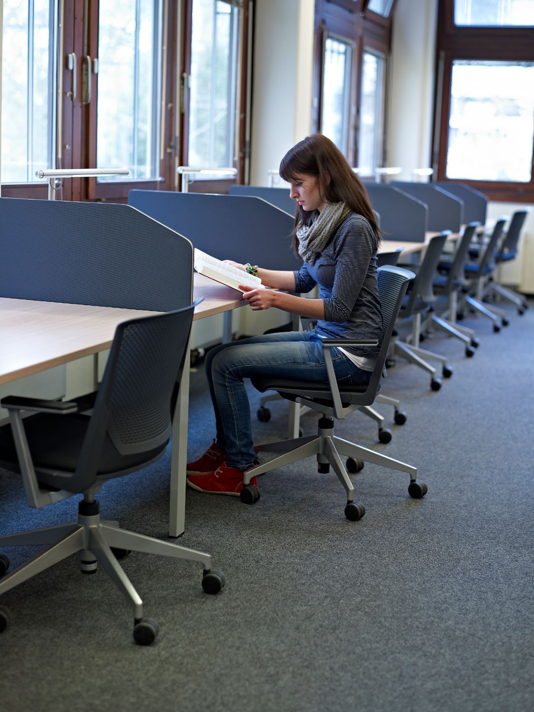 Navy Blue Very conference chairs at individual work booths