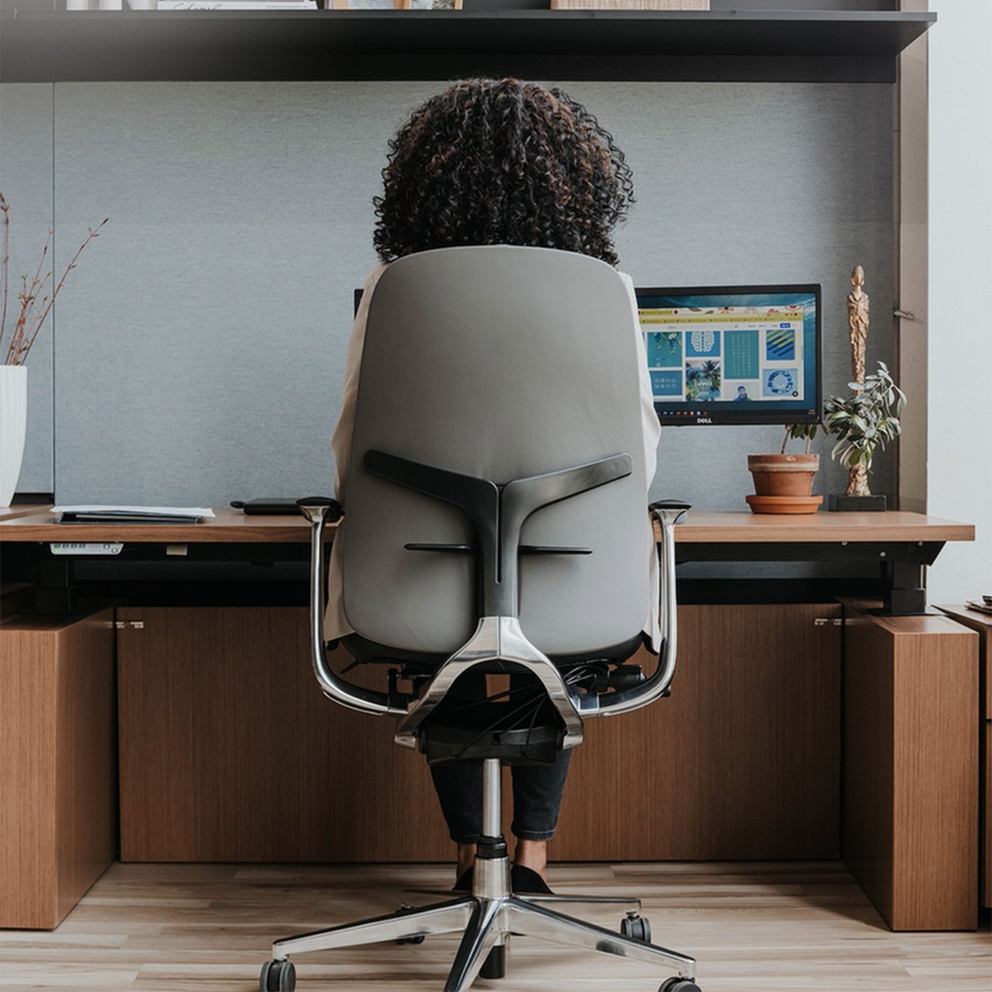 Haworth Zody II chair in grey upholstery in a office space