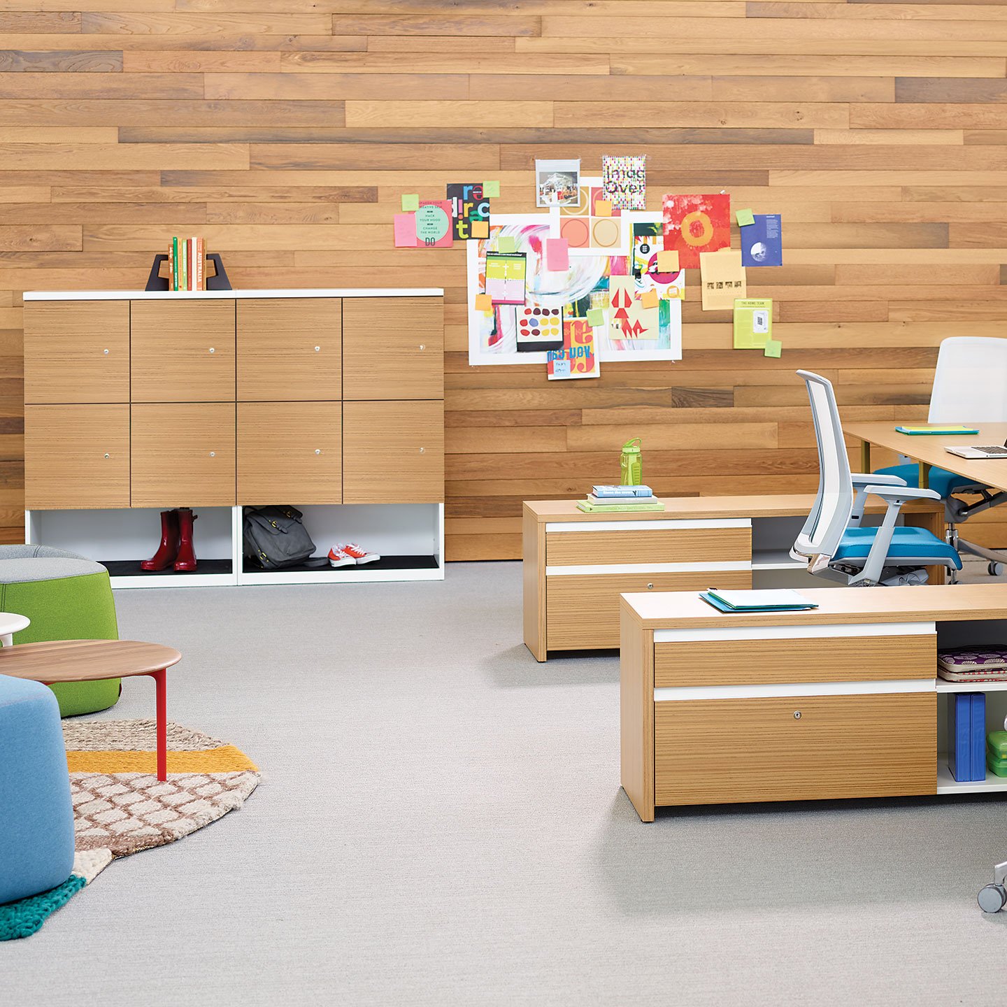 A Series cabinet storage at individual workspace with gray Soji chair.