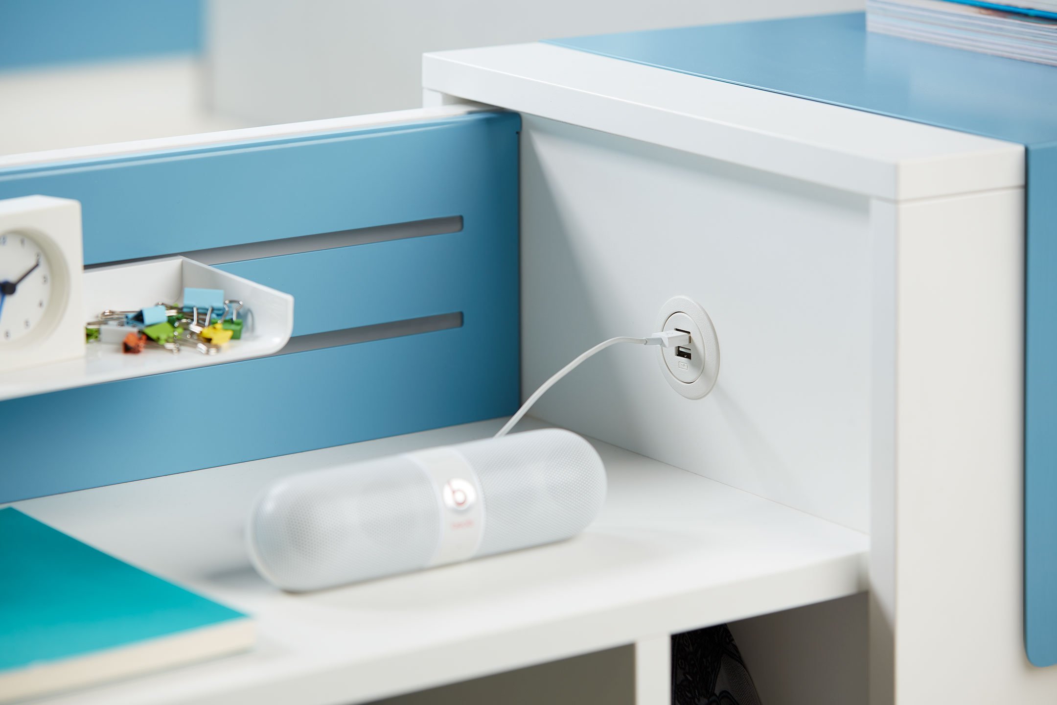 Beside storage pantry with USB charging capabilities in white