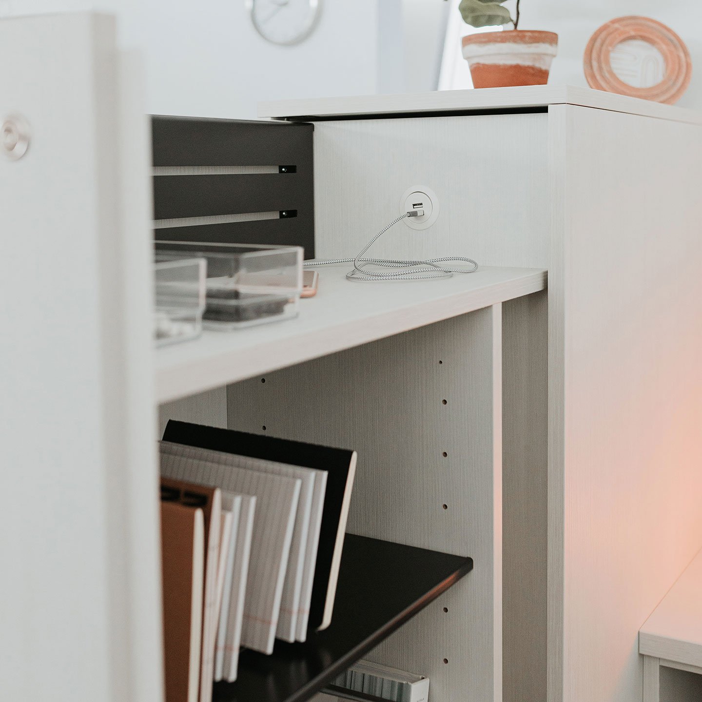 Haworth Beside storage pantry in white with a UMA lamp next to it inside a room view 2