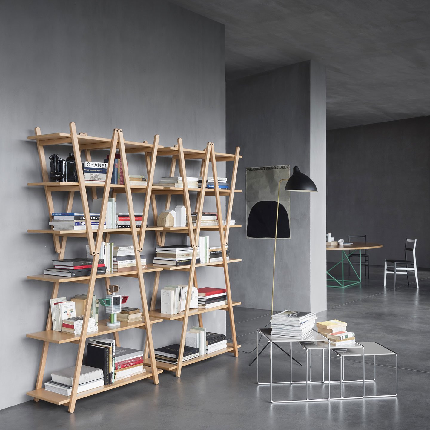 Nuvola Rossa bookshelf in light wood in open office environment. 