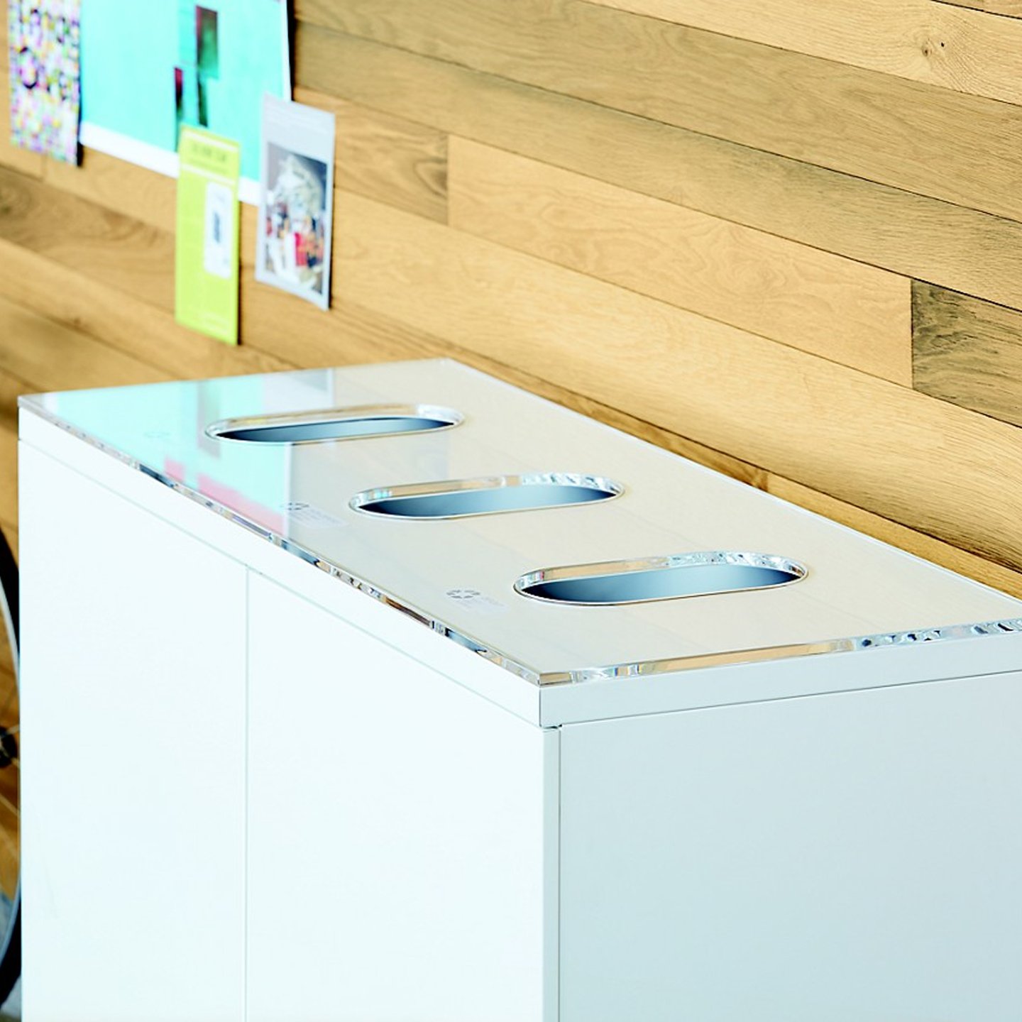 Three section X Series recycling unit in white in open workspace