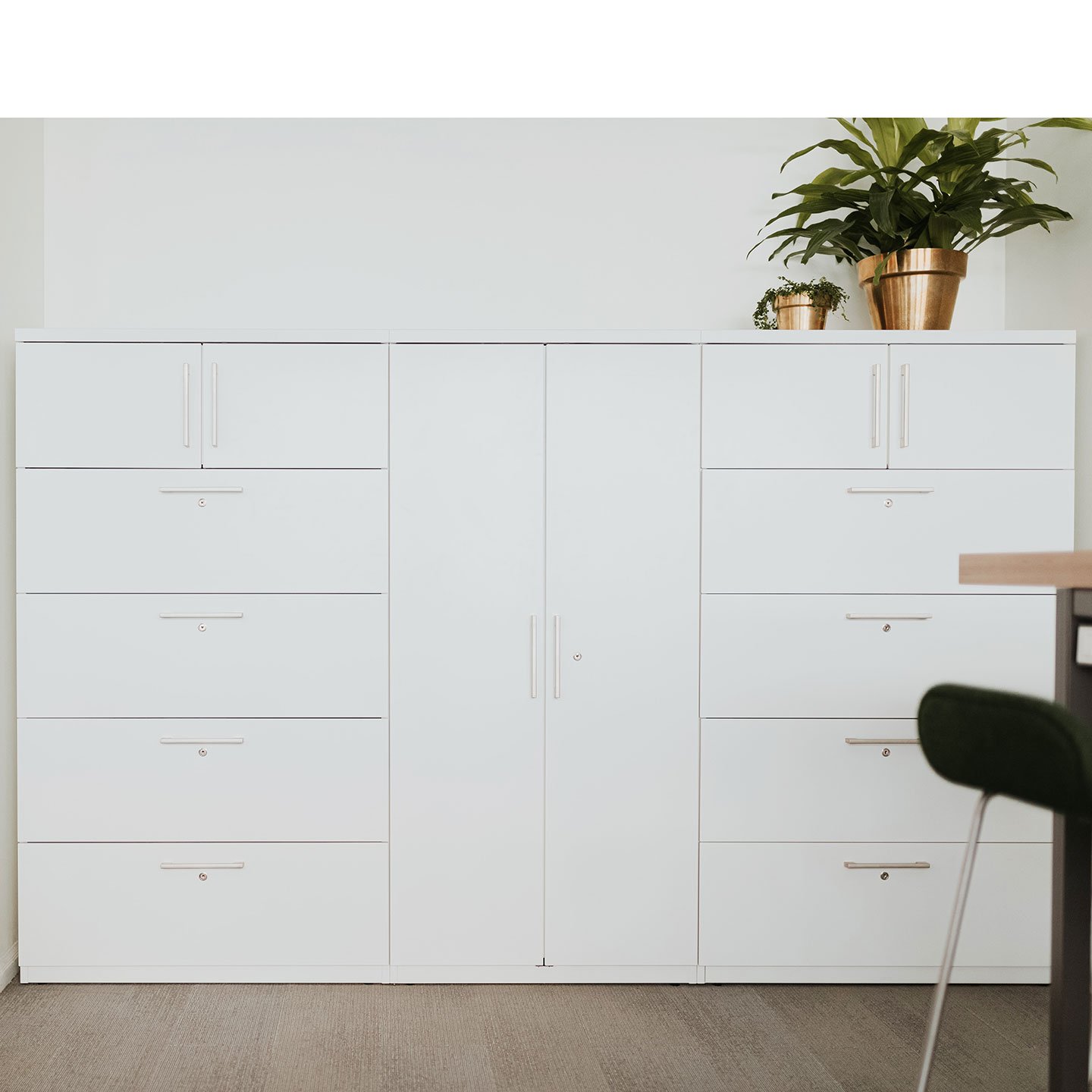 X Series storage unit in white with drawers and hinge door cabinets