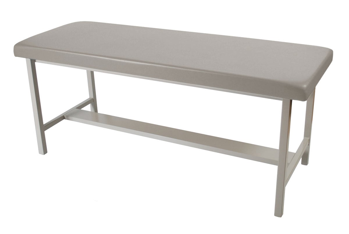 Haworth Manual exam table with 4 legs and vinyl upholstery