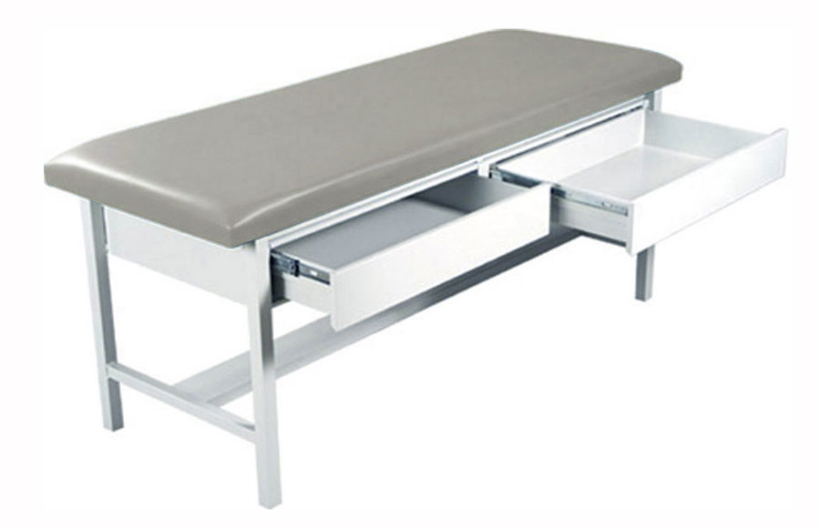Haworth Manual exam table with 4 legs and vinyl upholstery and drawers