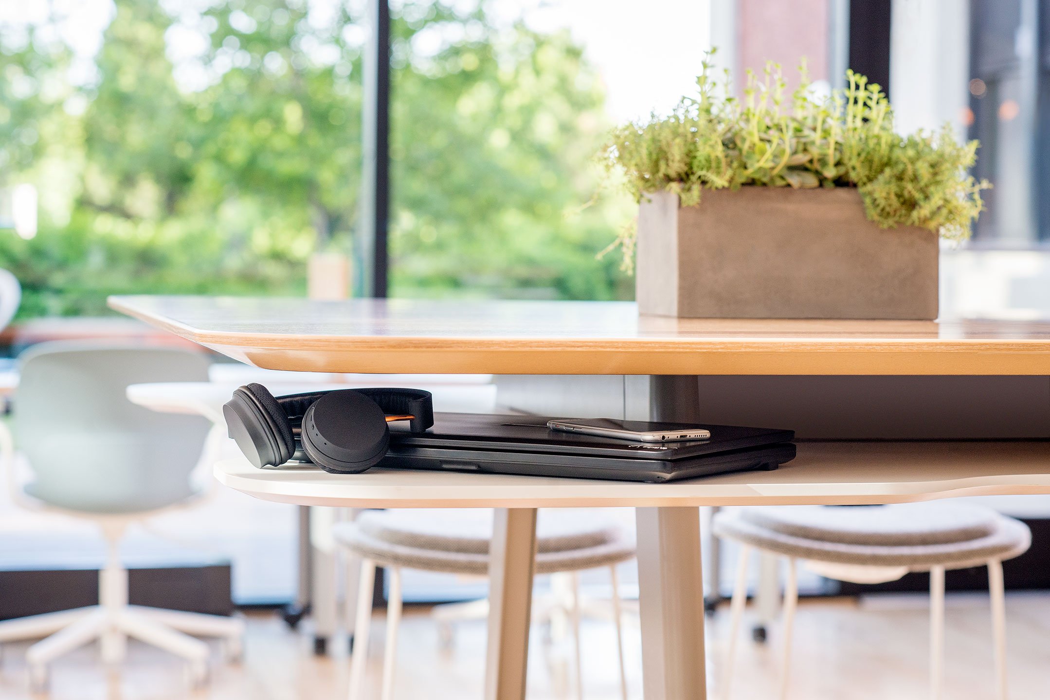 Haworth Immerse Table with a wooden top in an open office space