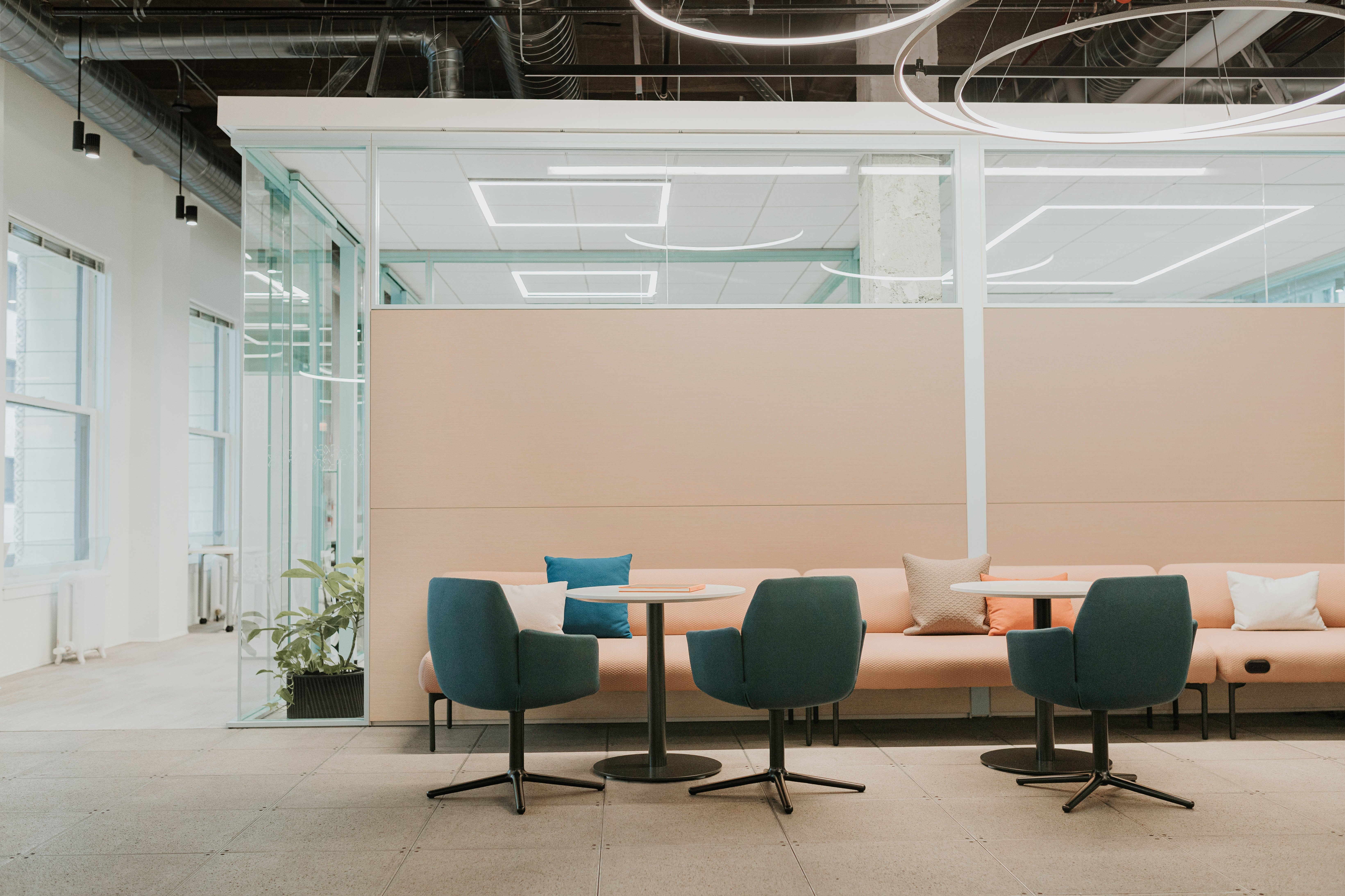 Haworth Planes Collaborative Table in a office seating area for collaboration with employees