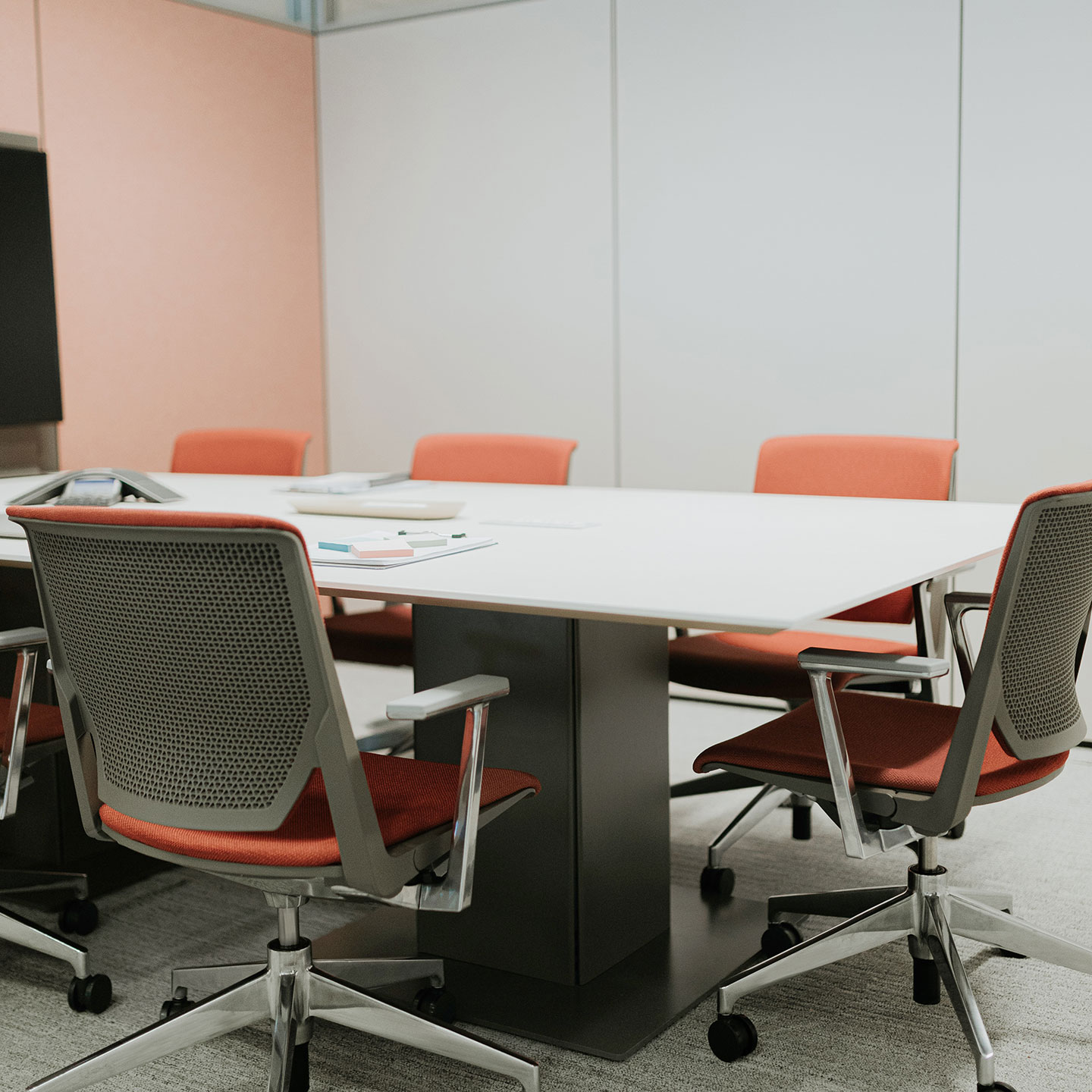 Haworth Planes Modern Conference Table in a office meeting room that is closed off