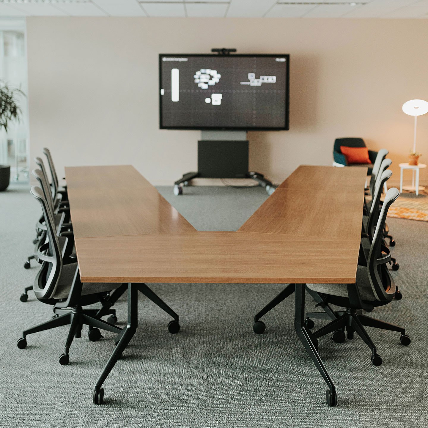 Haworth Planes Training Table in a closed conference set for a meeting with a monitor