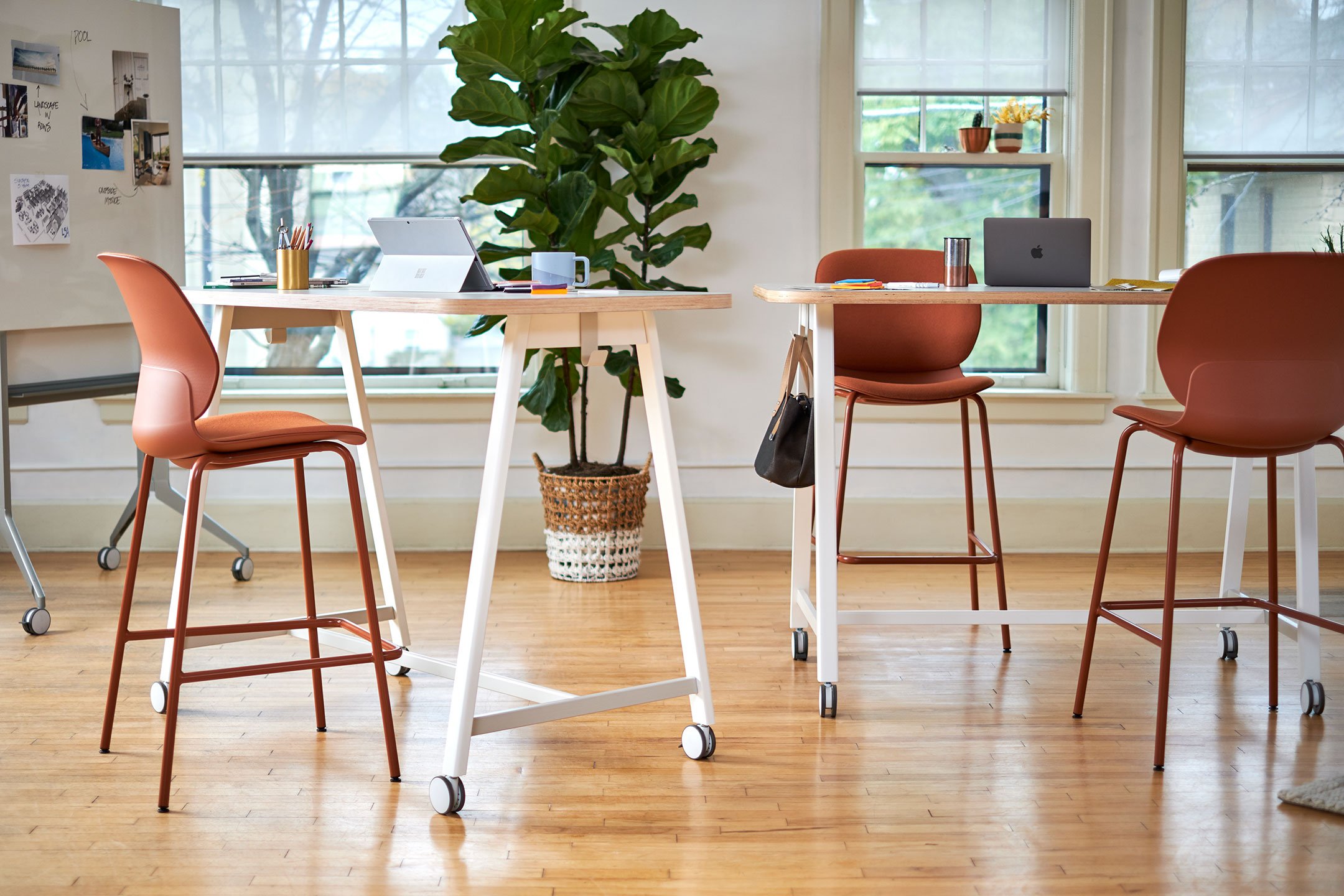 Haworth PopUp Table in open area of office used for collaboration being used as work spaces