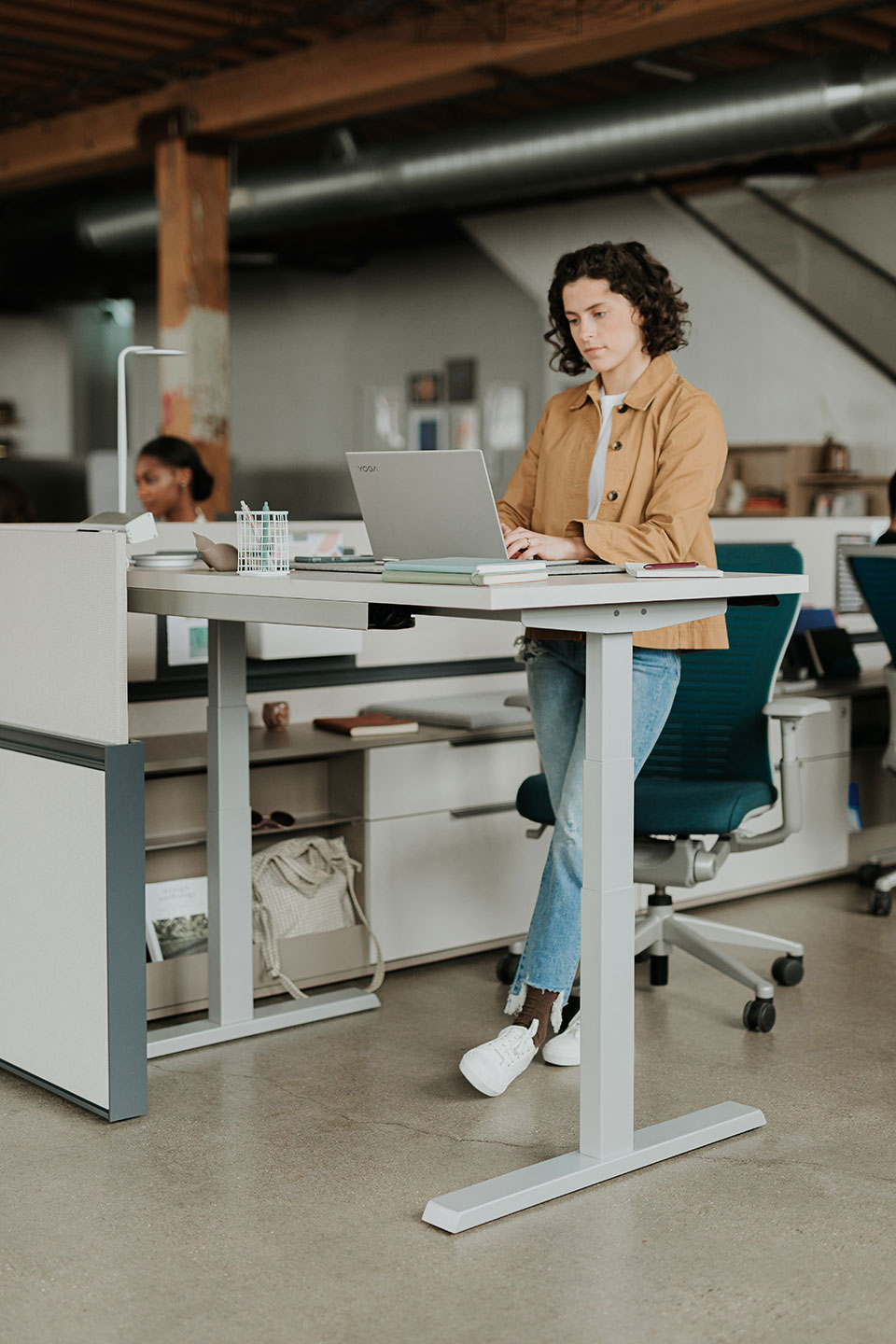 Haworth Upside Height Adjustable Table being used in as an office workspace