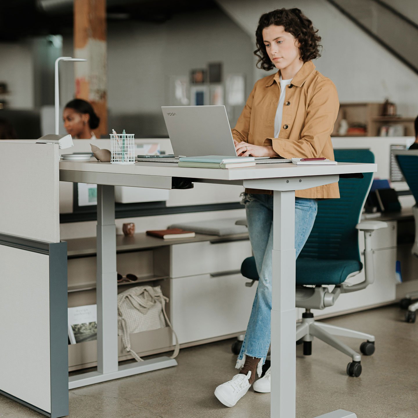 Haworth Upside Height Adjustable Table being used in a office workspace