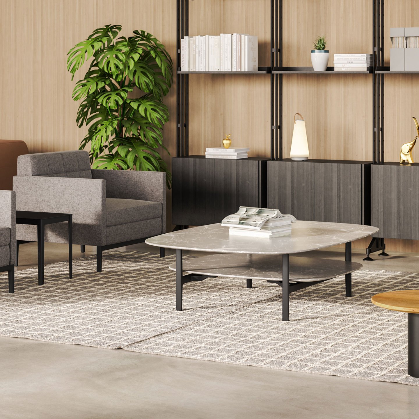 Haworth Volage Table double tier in calcutta marble top in a office lounge area with books on the table