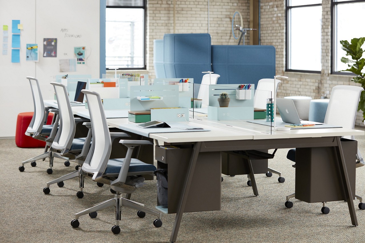 Haworth Very Task chairs in various colors and models in office spaces