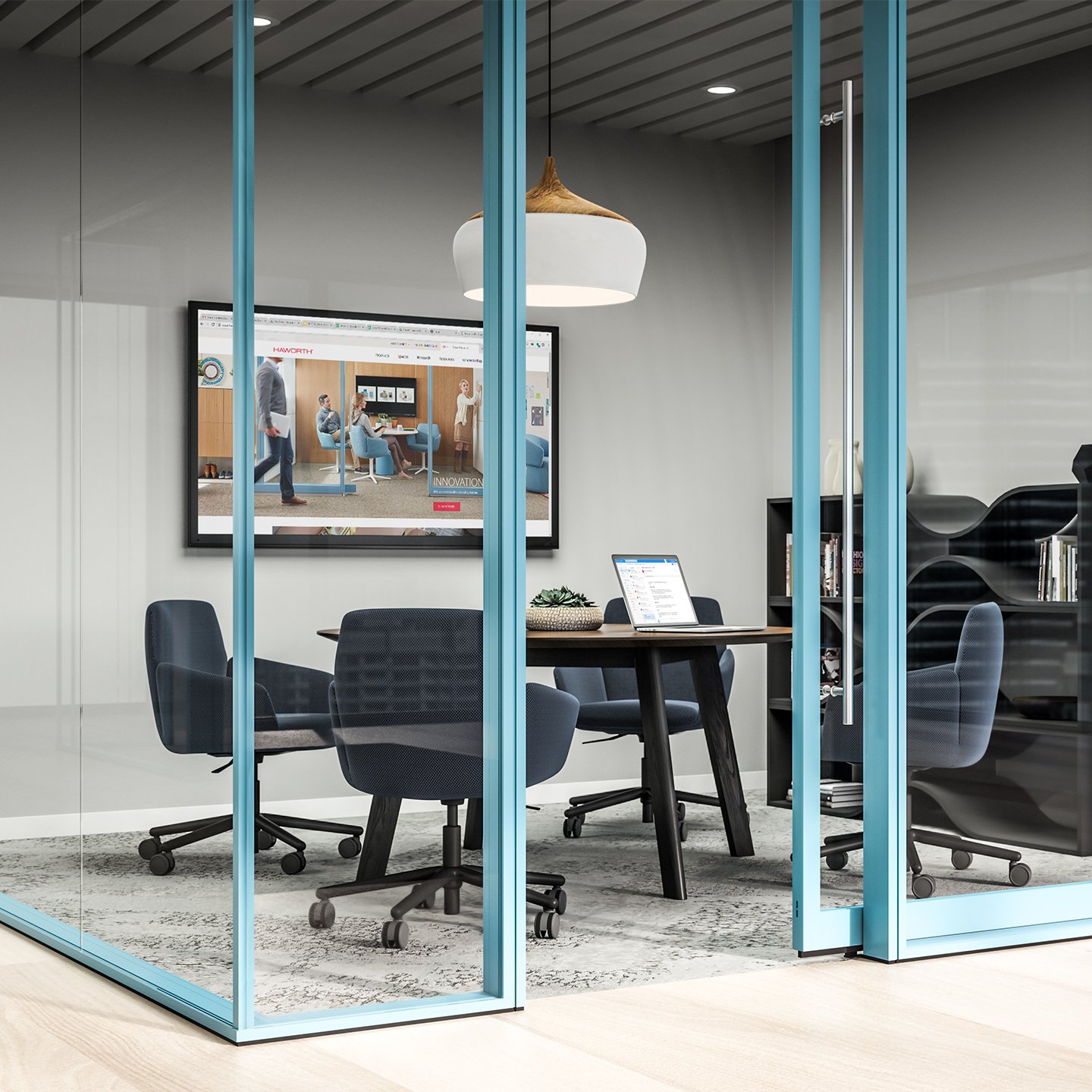 Haworth Enclose Frameless Glass 2 Wall in private collaboration room in office with navy blue chairs and circular chair with blue trim on wall