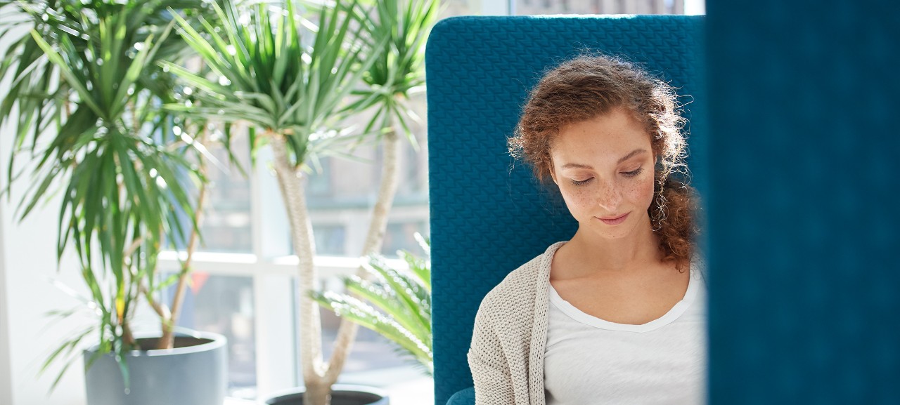 Woman Working in Cabana Lounge Chair